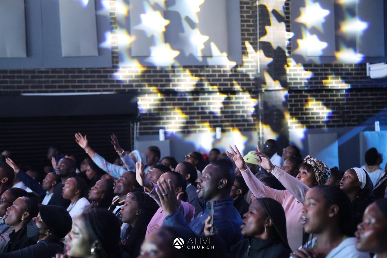 People worshipping at an Alive Church Sunday service